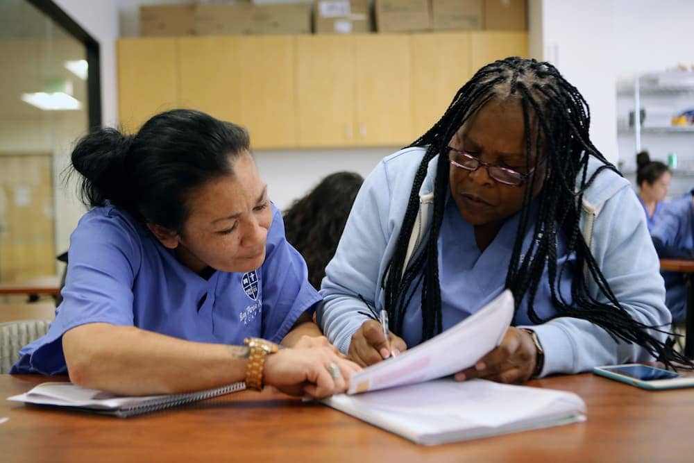 A Medical Assistant seeking to expand her career path by enrolling in the Bay Area Medical Academy's 3-in-1 Medical Assistant with Phlebotomy training.