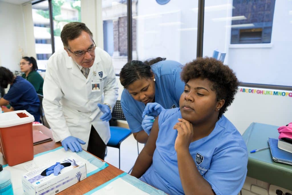 A group of Medical students are preparing themselves to enter the healthcare field for the first time and work in a hospital,clinic or physician's office.