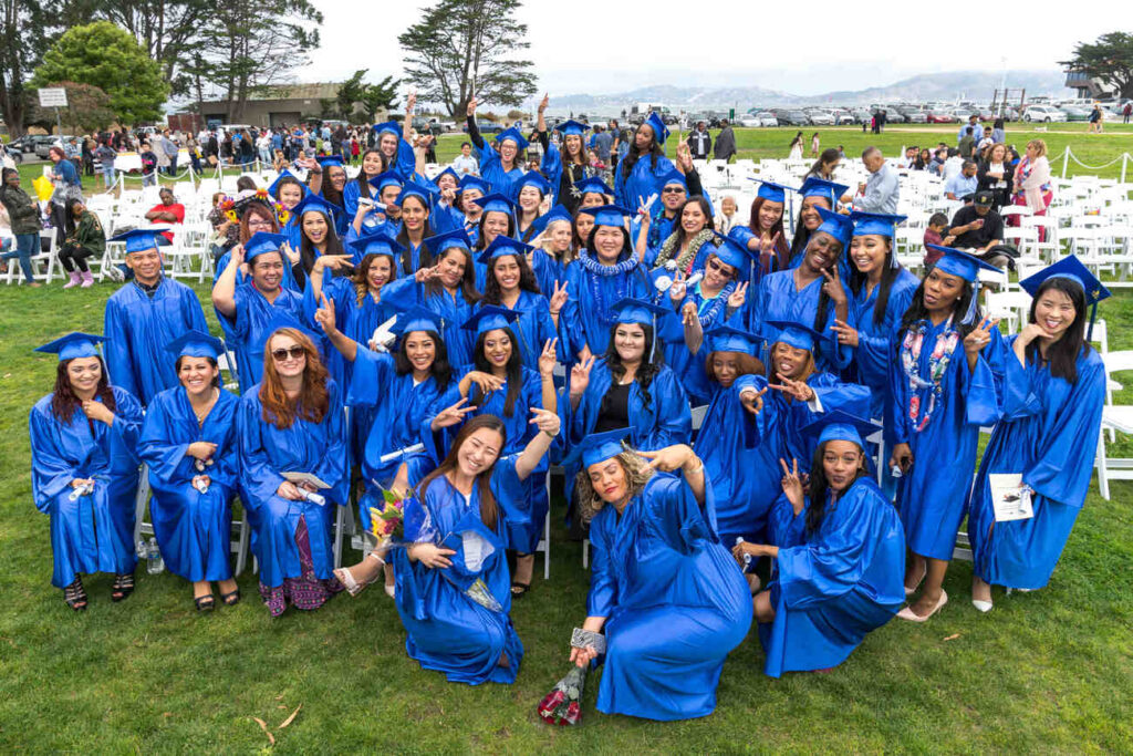All the Bay Area Medical Graduates pose for a group picture in their Graduate attires.