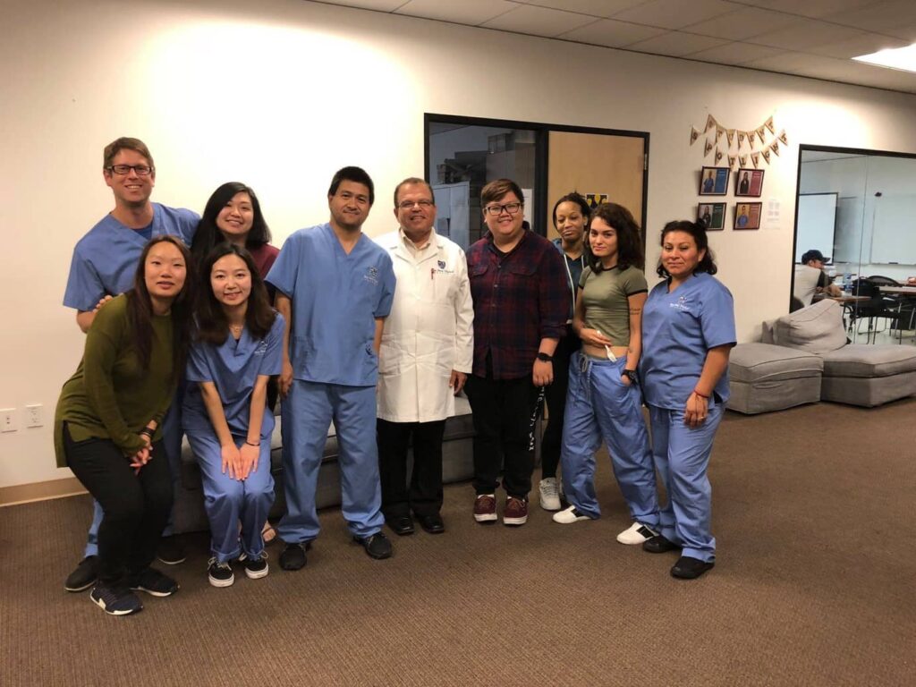 Bay Area Medical & Pharmacy students pose for a picture after class.
