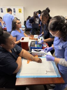 Students practicing to be entry level medical assistants