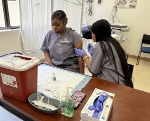 Medical assistant students learning in labs before their medical assis.tant externships